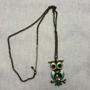 Long, green and black owl pendant necklace with brass chain